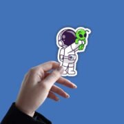 Astronaut Holding Baby Alien Sticker - Image 4